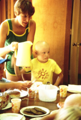 League Member Serving Food to Children Slide, August 1981