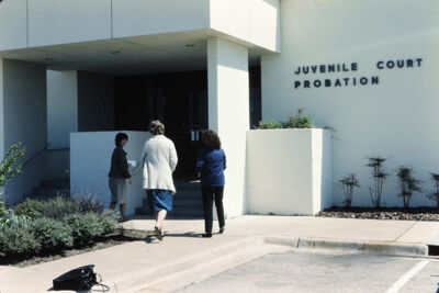 League Members Outside Juvenile Court Building Slide, April 1984
