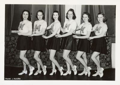 two gamma sigma chapter members with dates photograph, c. 1934 (image)