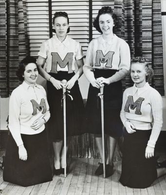 two gamma sigma chapter members with dates photograph, c. 1934 (image)