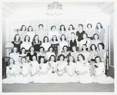 two gamma sigma chapter members with dates photograph, c. 1934 (image)