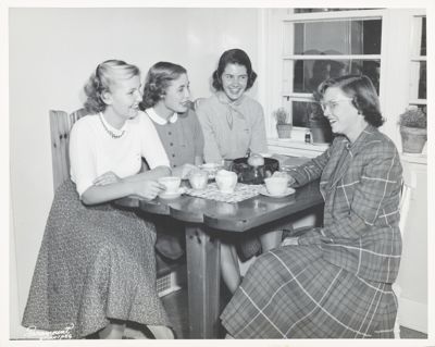 two gamma sigma chapter members with dates photograph, c. 1934 (image)