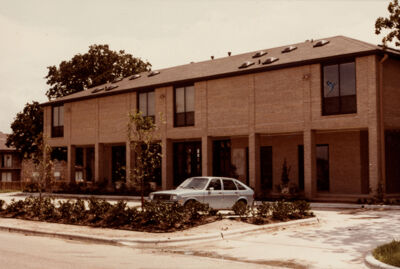 epsilon rho chapter house with sheet sign photograph, 1982 (image)