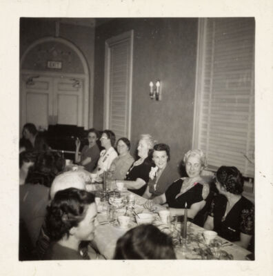 two delta mu chapter members attend a chapter meeting, c. 1989 (image)