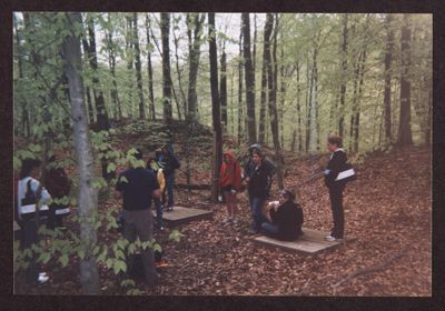 wooded area with wooden footbridge photograph, april 2004 (image)