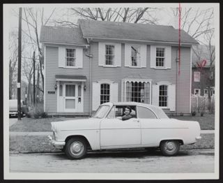 Doris Corbett in Automobile in Front of Foster Street Office Photograph