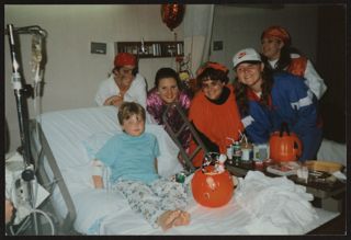 Delta Pi Chapter Members with Children's Unit Patient Photograph, October 1995