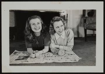 Ronnie DeNure and Unidentified Reading Newspaper Photograph, 1946-1947