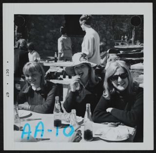 Three Beta Gamma Chapter Members at a Picnic Table Photograph 2, October 1967