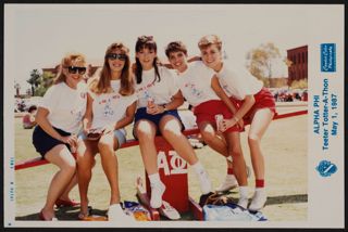Five Beta Epsilon Chapter Members Sitting on a Teeter-Totter Photograph, May 1, 1987