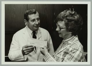 Elsie McKibbin Presenting a Check Photograph