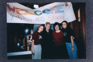 Mead, Eller, and Two Beta Gamma Chapter Members Slide