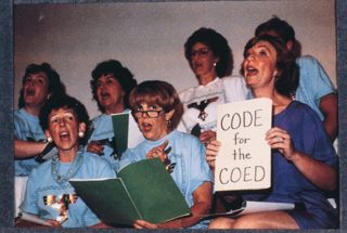 Alumnae Performing Code for the Coed Skit at Convention Slide