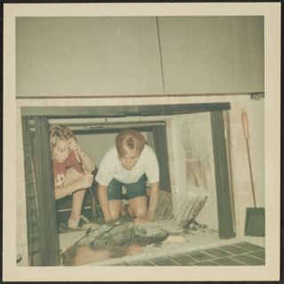 Martha Hadley and Mary Ann Eickhoff Cleaning the Fireplace Photograph, September 1967