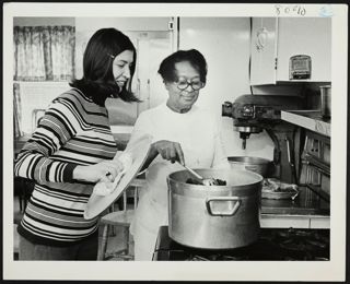 Mary Ann Otsuji and Mrs. Hester Young Cooking Photograph, 1989