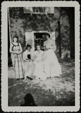 Four Unidentified Rho Chapter Members in Front of Chapter House Photograph, c. 1940s