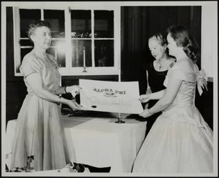 Davis, Marshall and Christianson Holding Charter Photograph, June 1958