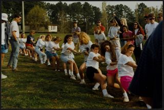 Epsilon Phi Chapter Members Play Tug of War at Greek Week Photograph, February 4, 1992