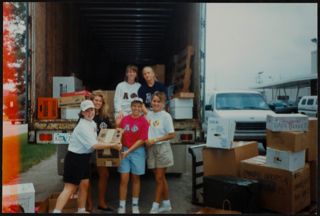 Zeta Psi Chapter Members Packing Food Photograph, November 1992