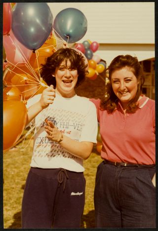 Tonya Cress and Michelle Crivello Holding Balloons Photograph