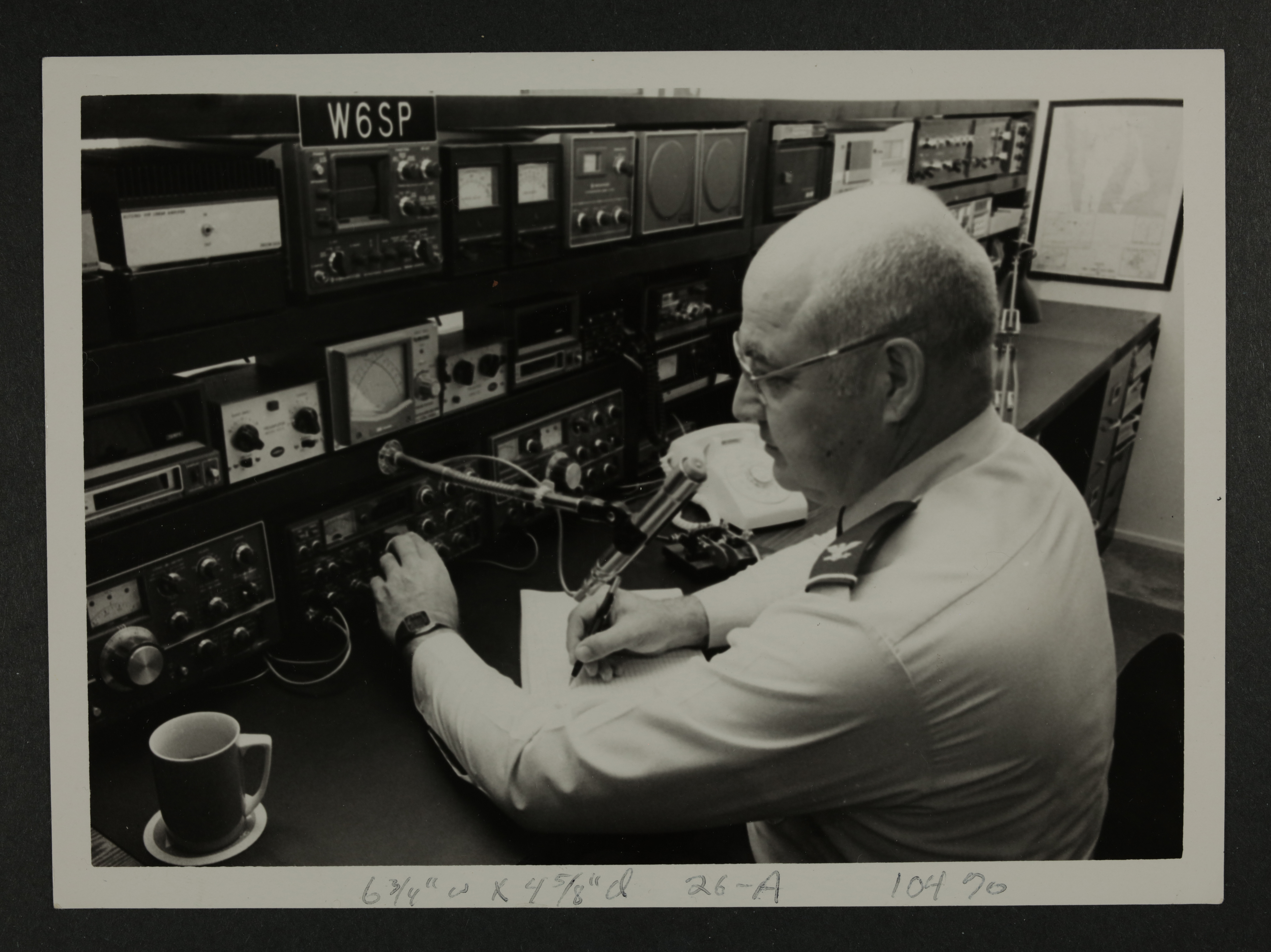 Unidentified Air Force Serviceman at Radio Controls Photograph