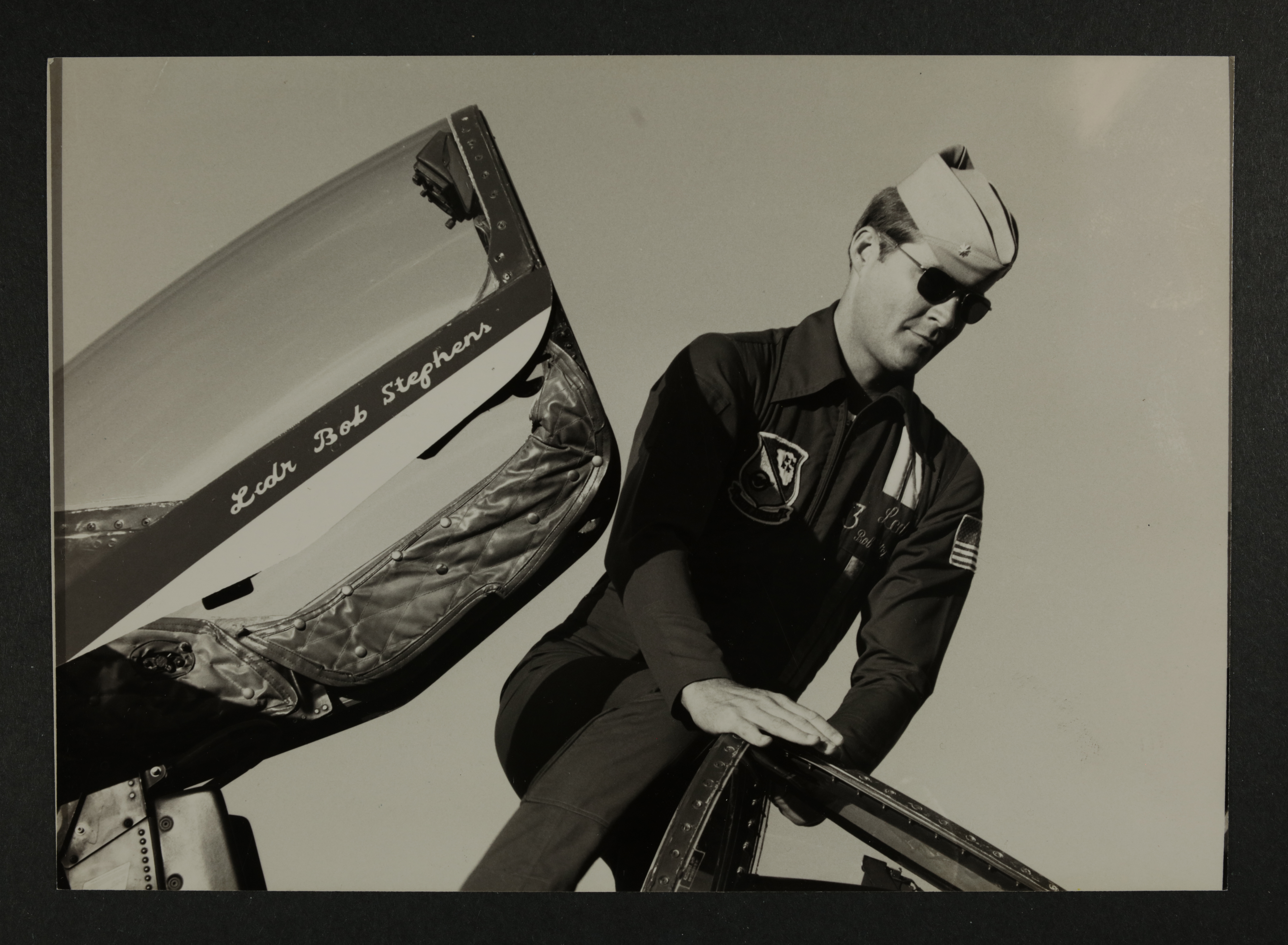 Bob Stephens Climbing into Airplane Photograph
