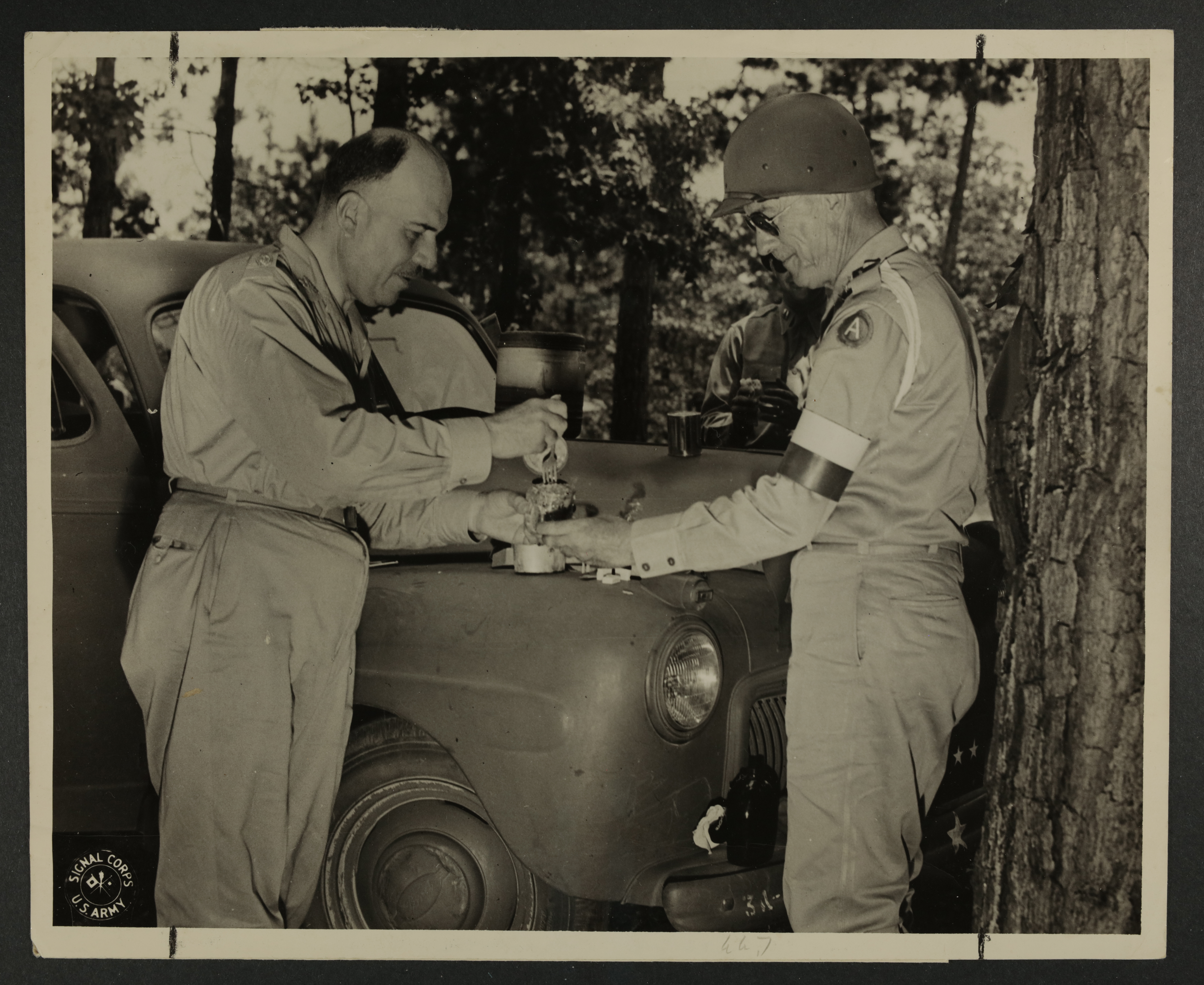 Lt. Gen. Hodges and Gen. Urquizo Eating "C" Rations Photograph, c. 1942
