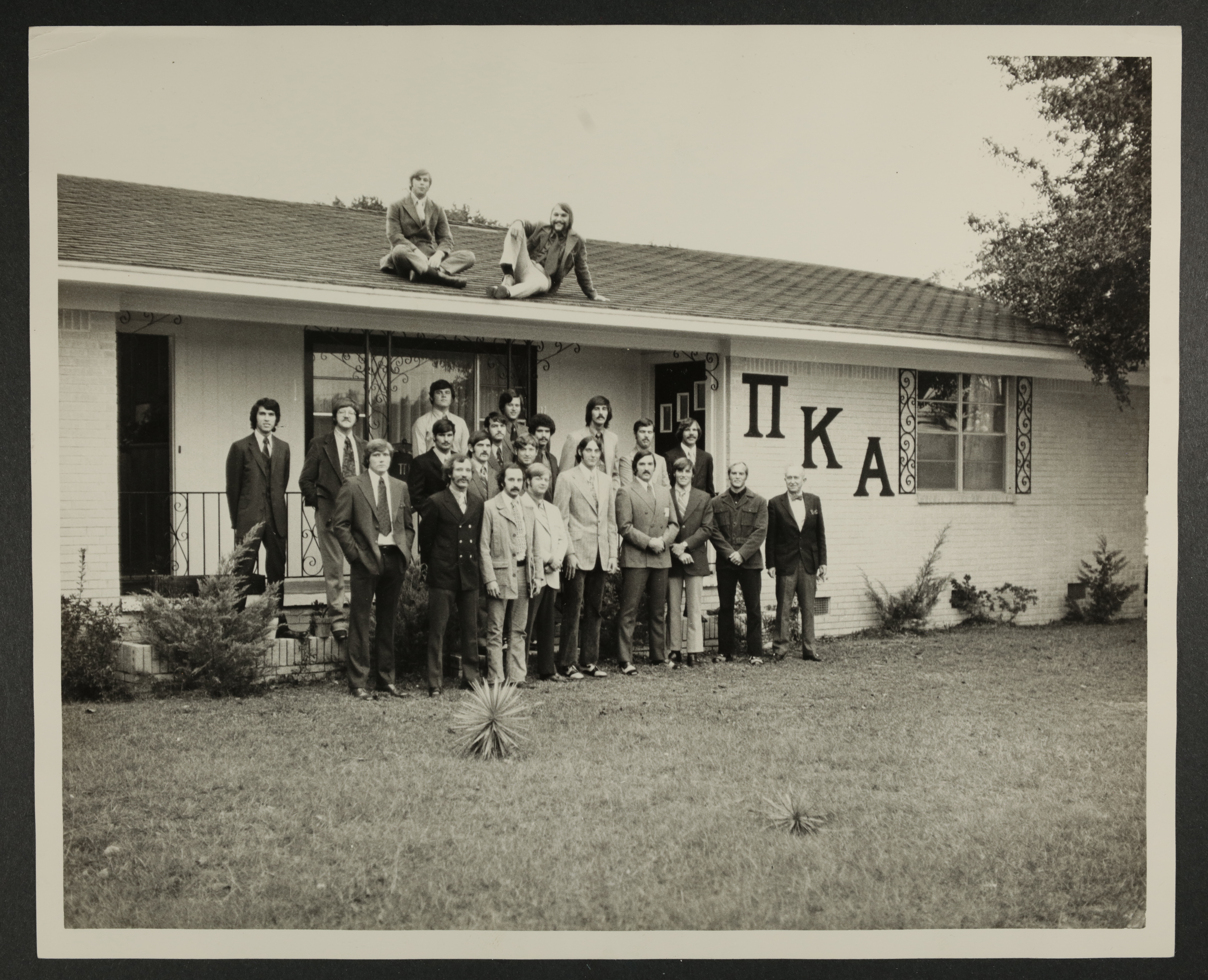 Eta Pi Chapter Members Outside House Photograph, Fall 1972