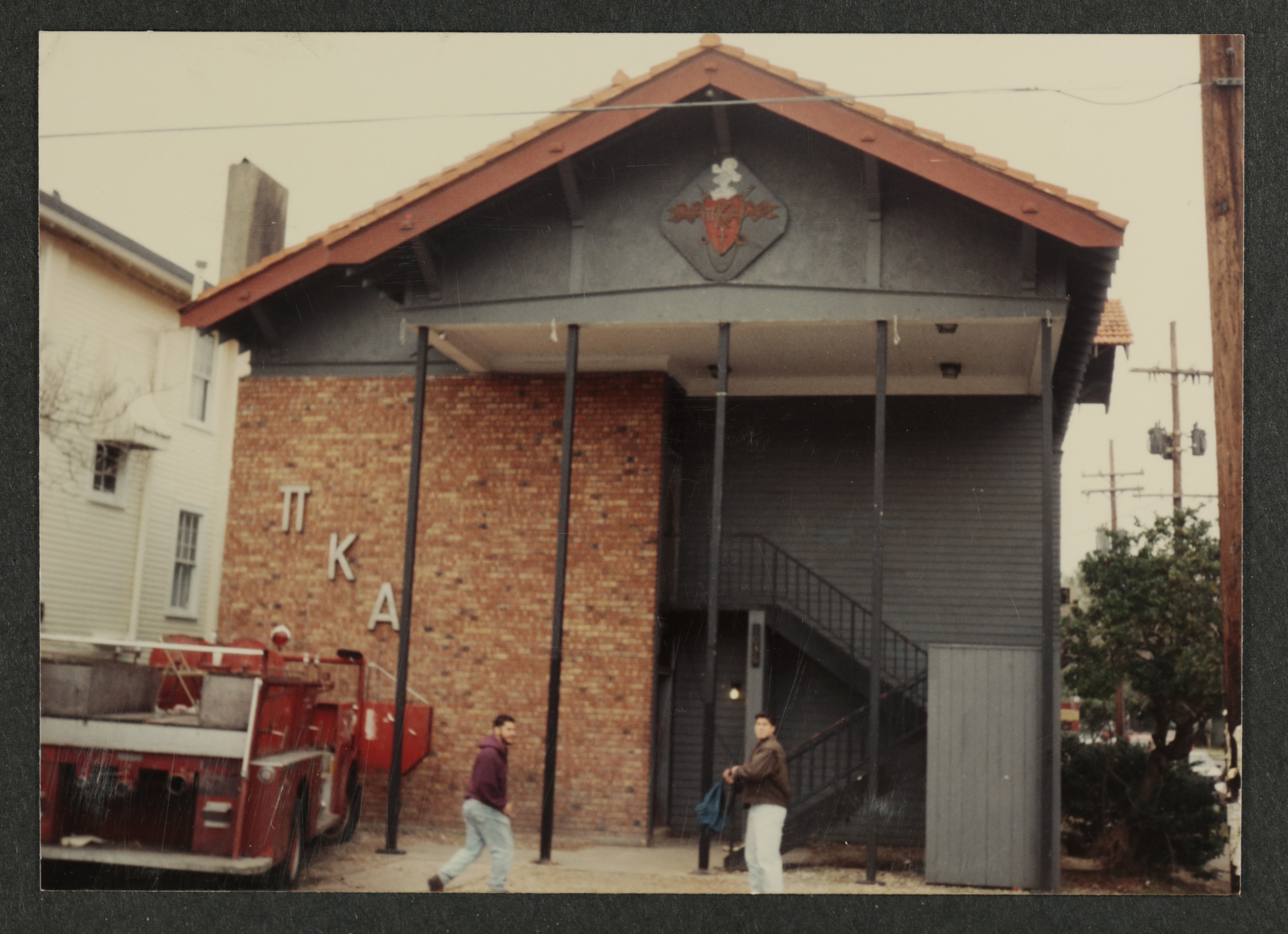 Eta Chapter House and Fire Truck Photograph, February 1995