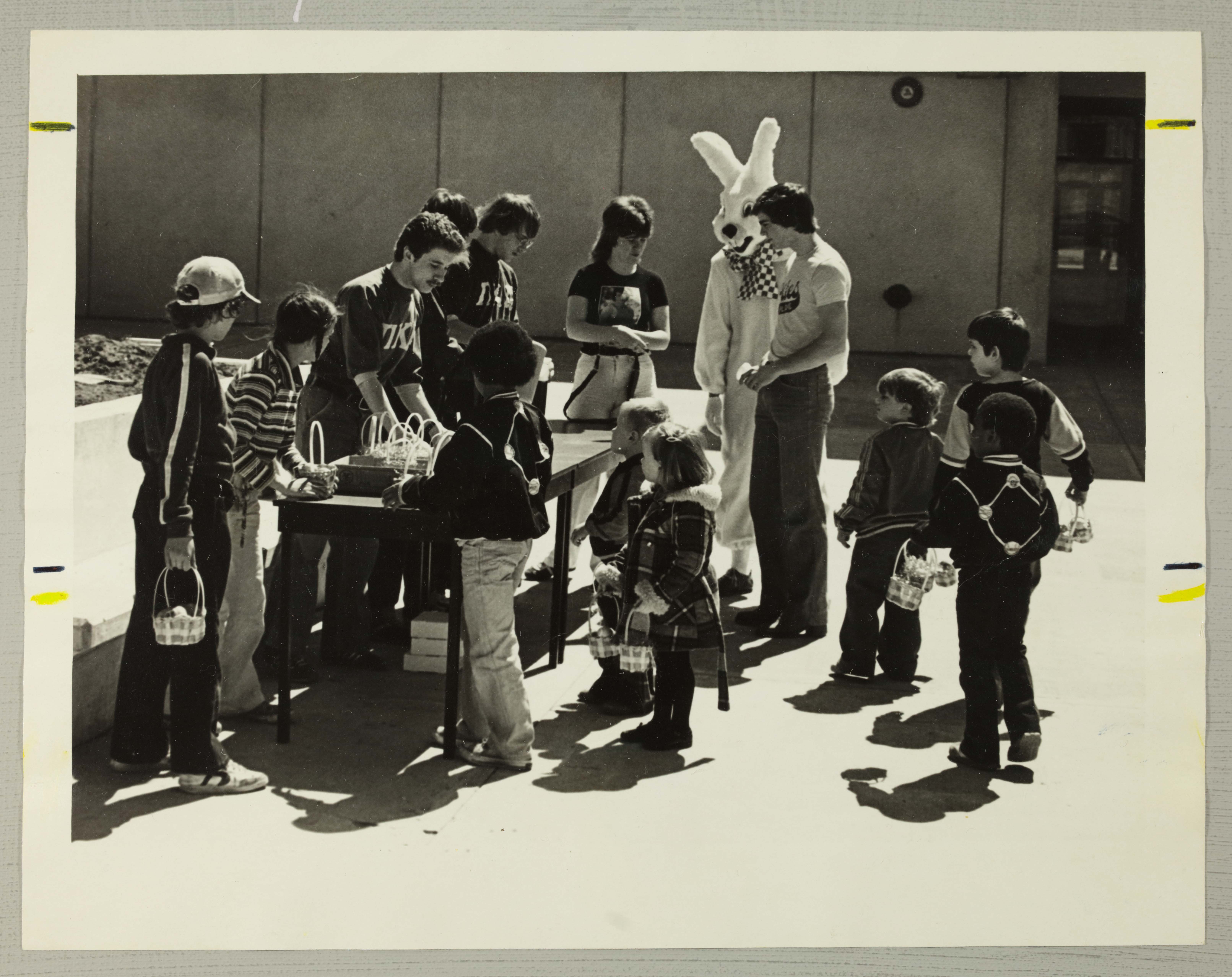 Eta Rho Chapter Members and Children at Easter Egg Hunt Photograph