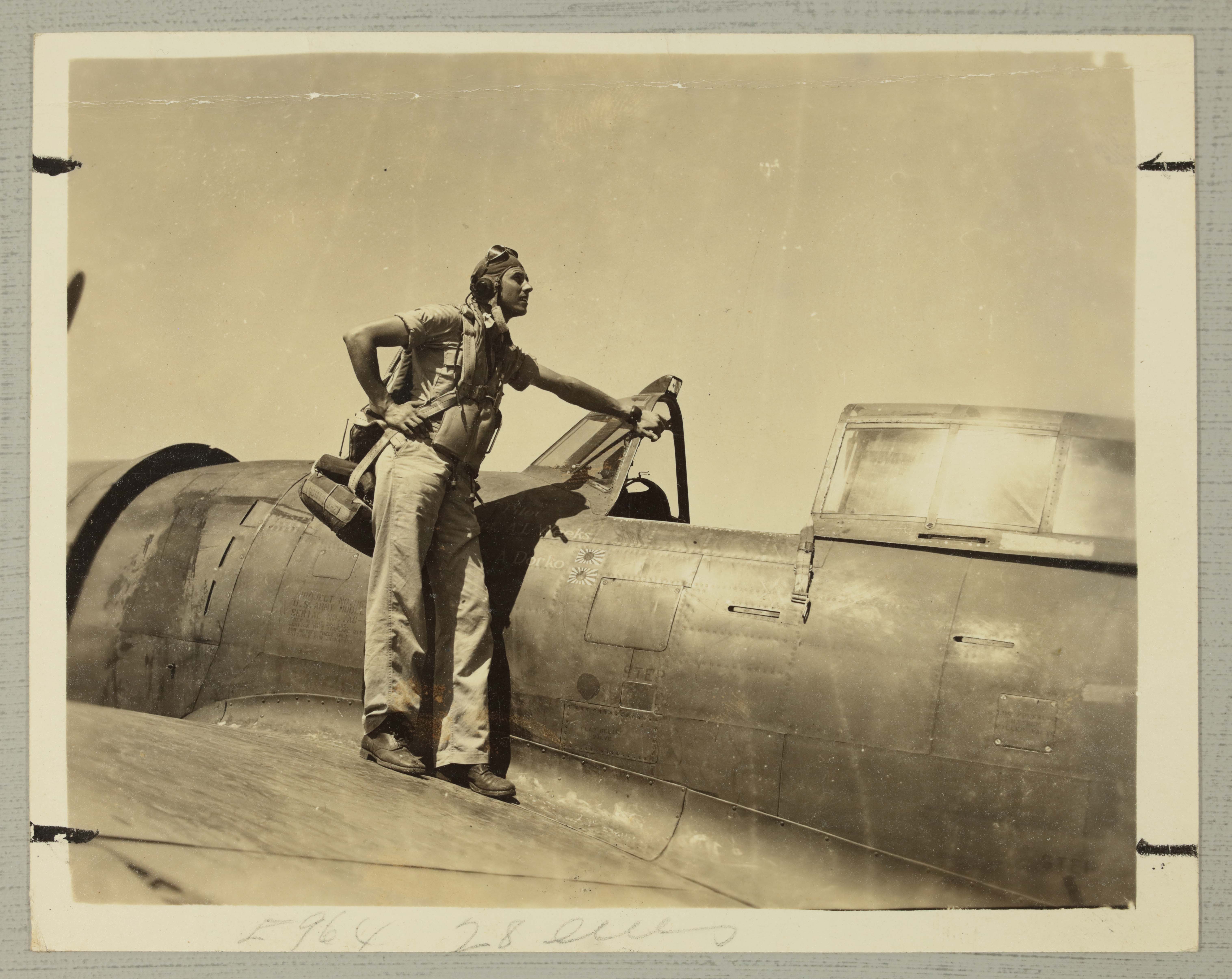 Arthur Weeks Standing on Airplane Wing Photograph, 1944
