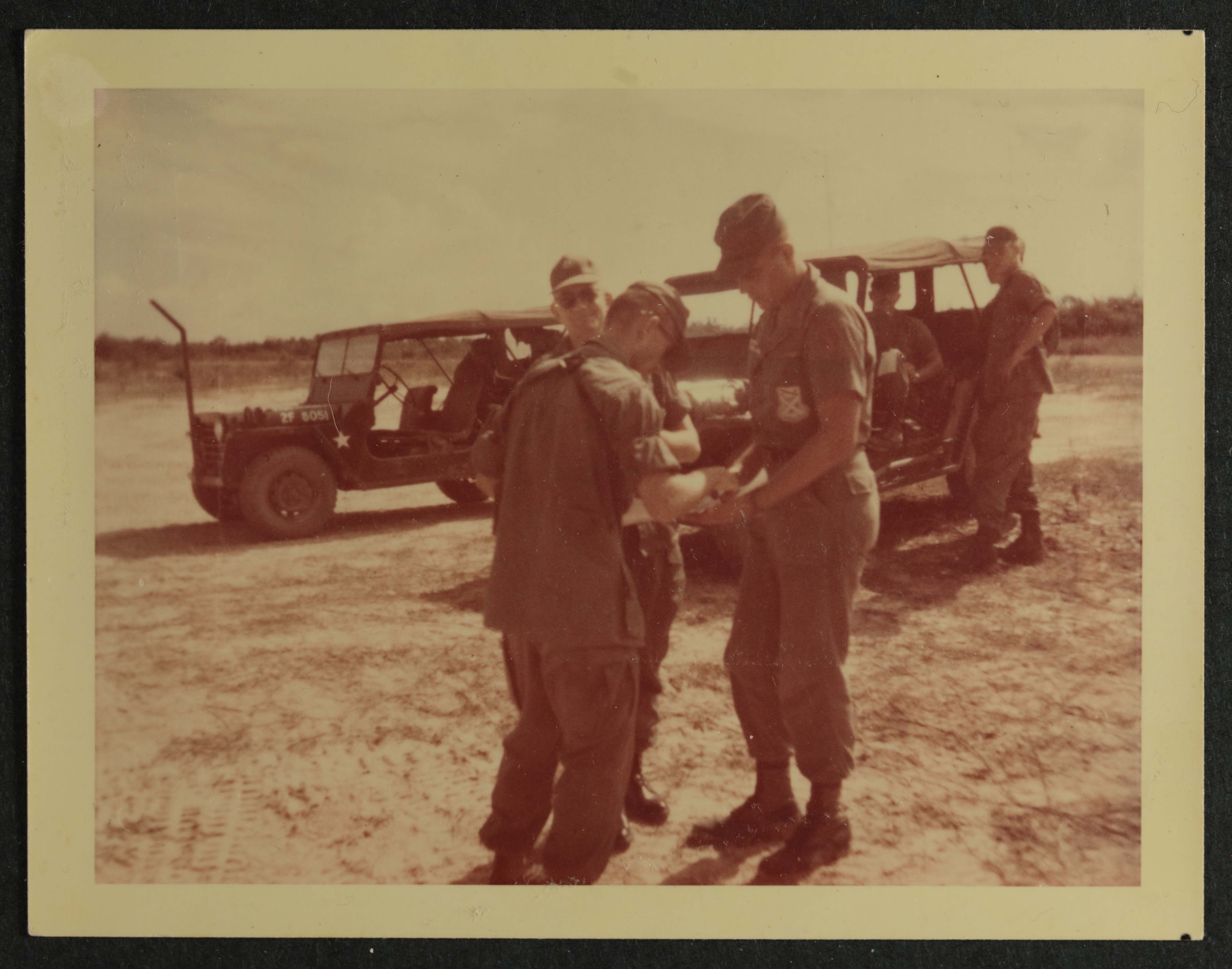 Paul Eklund Explaining Defense Perimeter Photograph, c. 1965