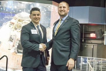 Two Unidentified Pikes Shaking Hands at the HAAA 150th Founders' Day Celebration Photograph, 2018