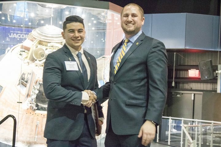 Two Unidentified Pikes Shaking Hands at the HAAA 150th Founders' Day Celebration Photograph, 2018