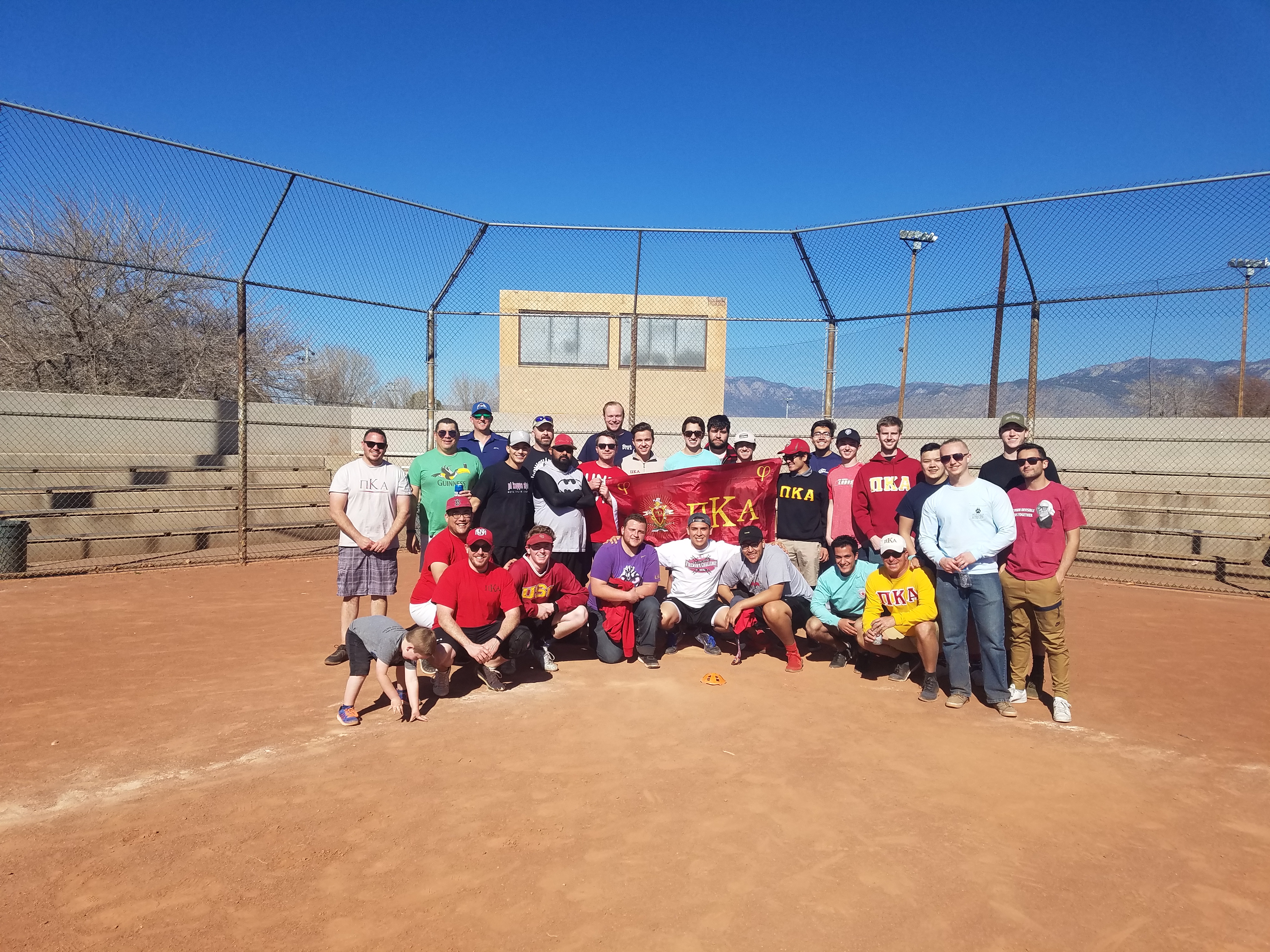 Beta Delta Chapter Members Stand on a Baseball Diamond Photograph, 2018