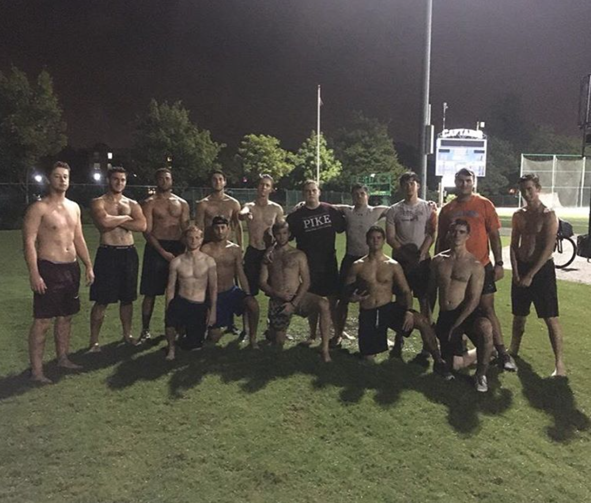 Fifteen Mu Rho Chapter Members Play Football Photograph