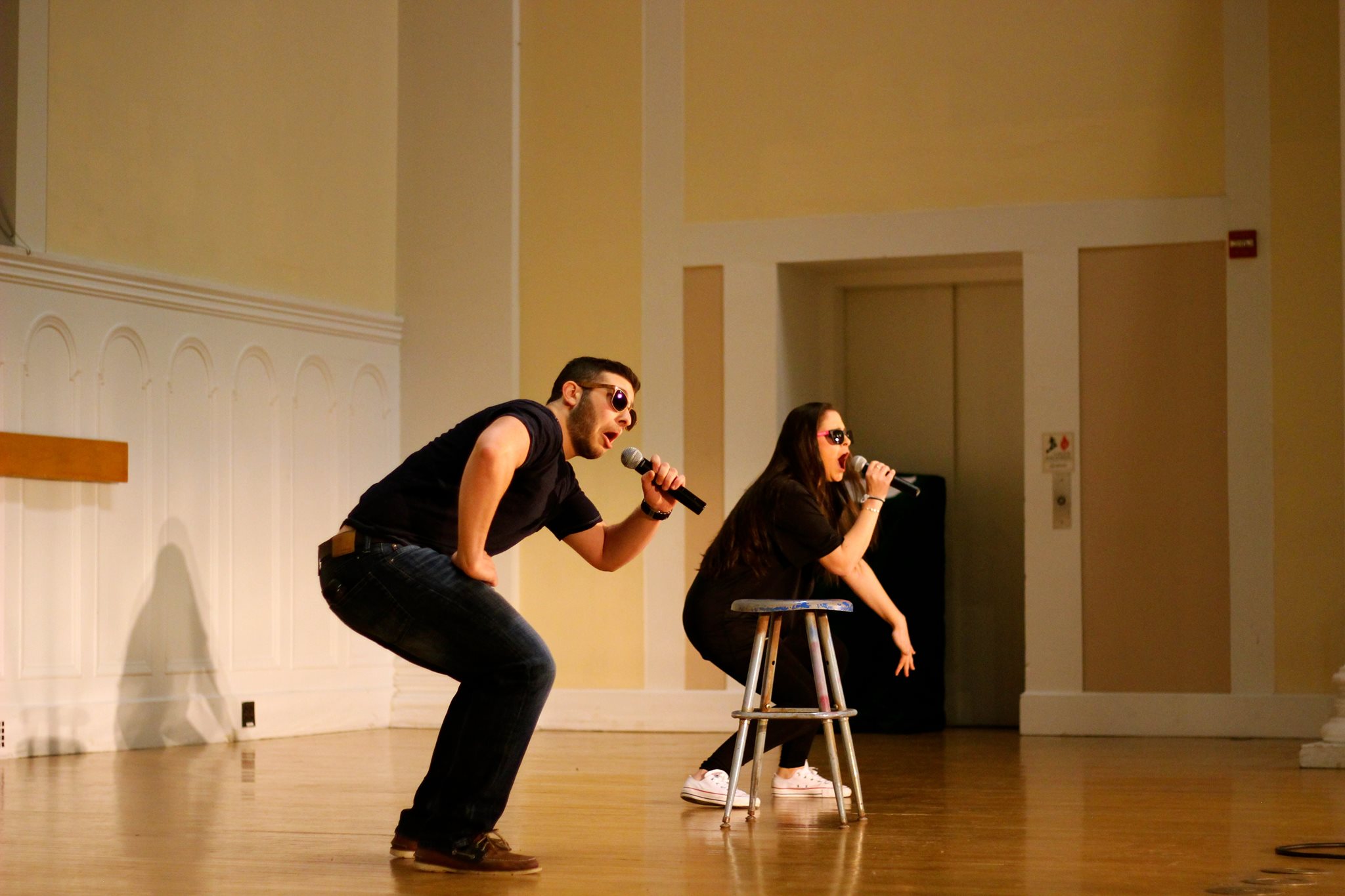 Lambda Delta Chapter Member and Unidentified Performing On Stage Photograph