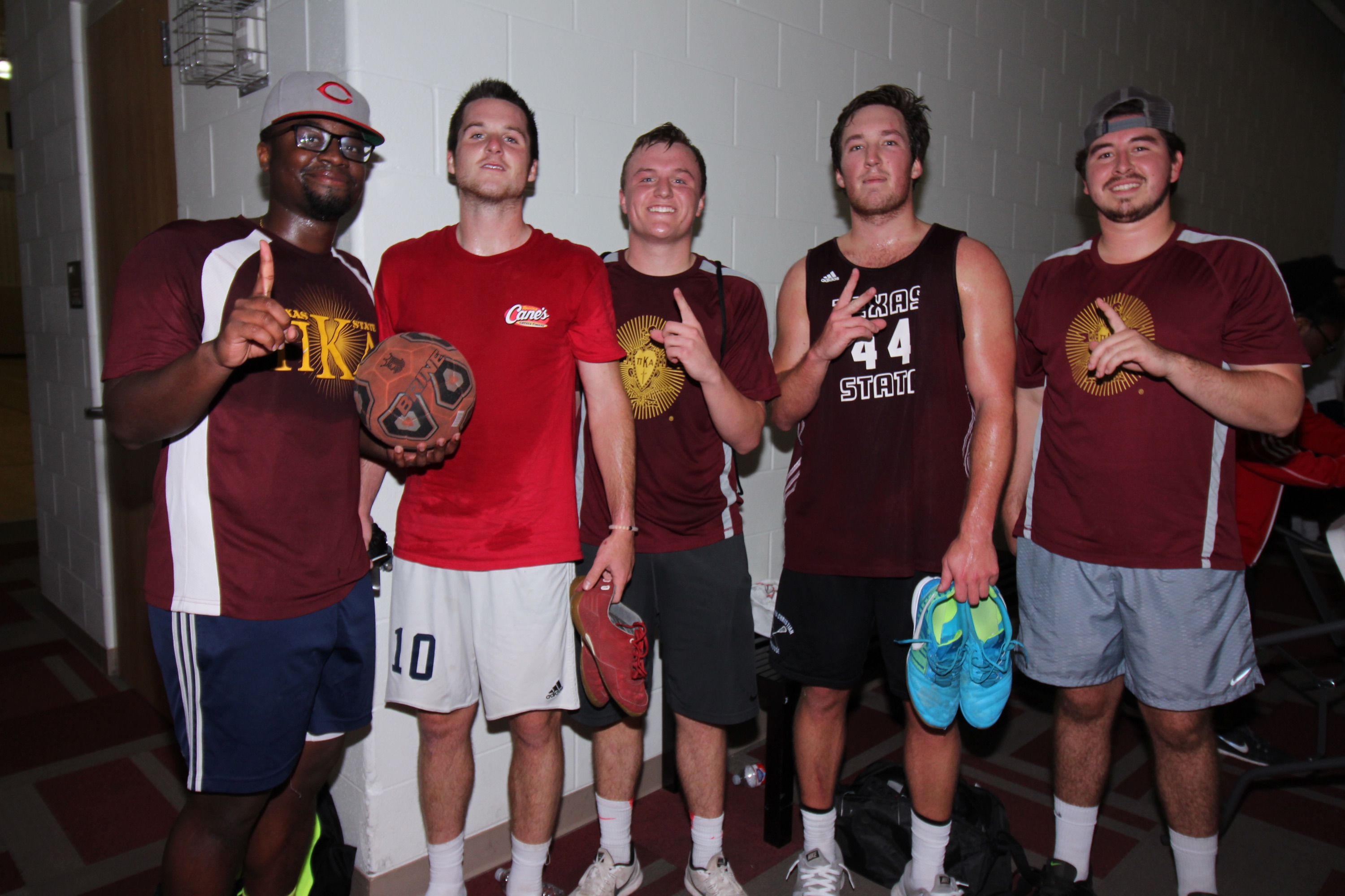 Five Zeta Theta Chapter Members Play Soccer Photograph
