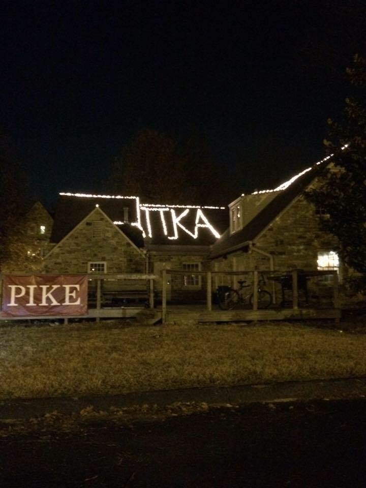 Theta Chapter House With Lights on the Roof Photograph