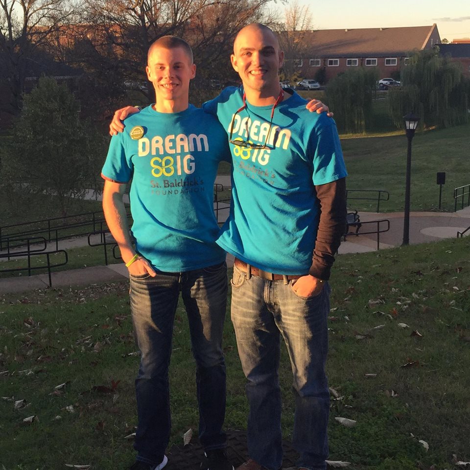 Two Unidentified Eta Tau Pikes Donate Their Hair Photograph