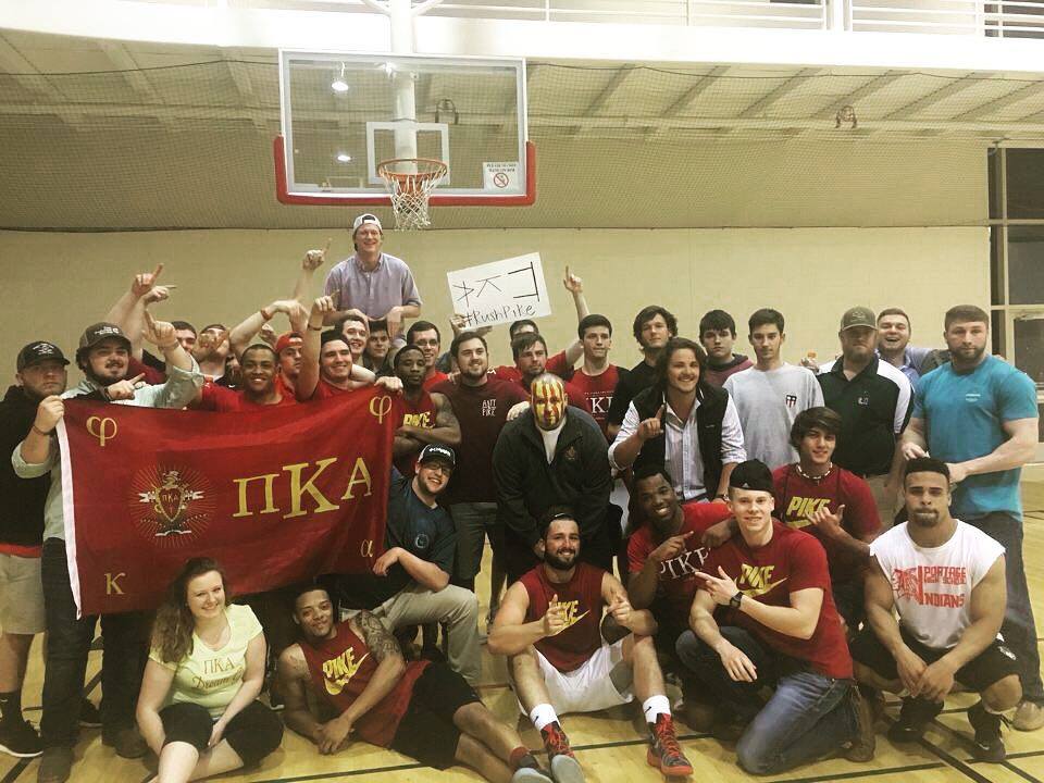 Eta Tau Chapter Members On A Basketball Court Photograph