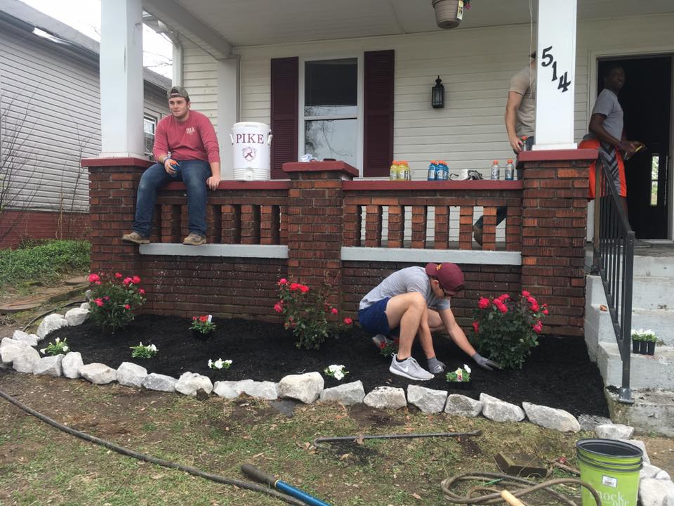 Four Unidentified Eta Tau Chapter Members During a Work Day Photograph