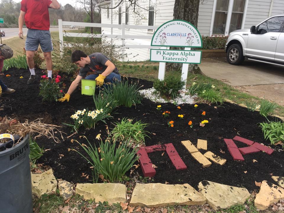 Two Unidentified Eta Tau Chapter Members Gardening Photograph