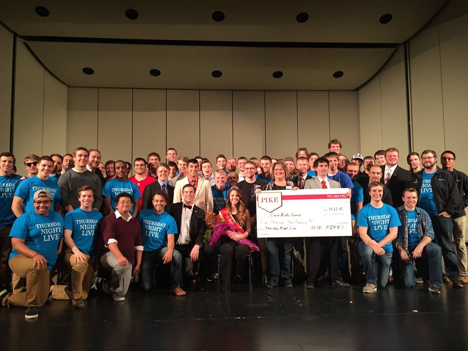 Kappa Pi Chapter and Their Dream Girl Donate To Cure Kids Cancer Photograph, November 12, 2015