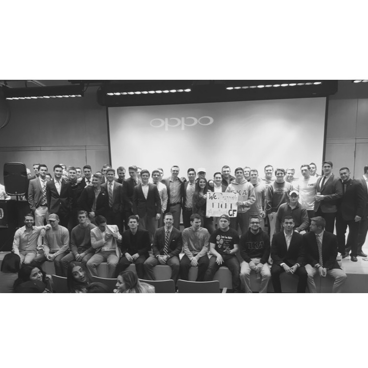 Mu Lambda Chapter Members Gather On A Stage Photograph