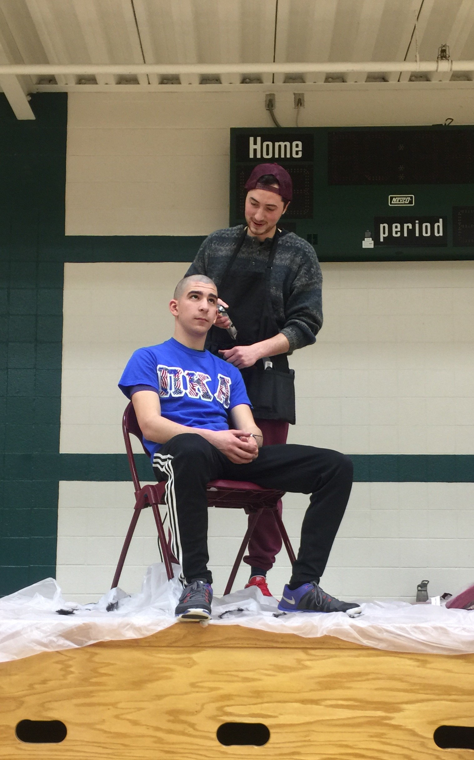 Justin Schwartz Shaves His Head For A Cause Photograph