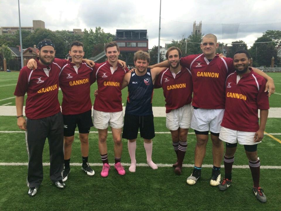 Seven Epsilon Upsilon Chapter Members Play Rugby Photograph