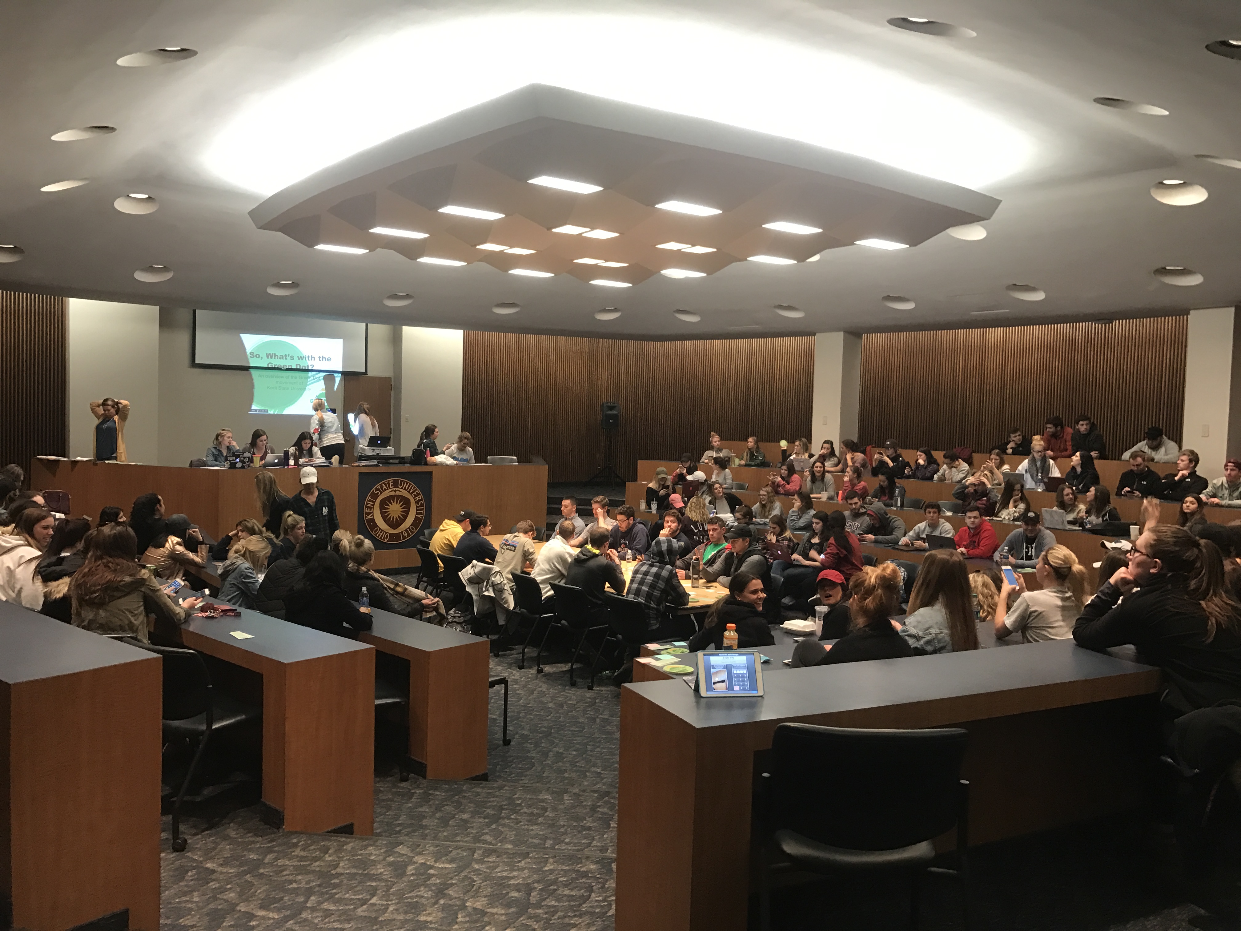 Mu Theta Chapter Members and Others In A Meeting Photograph
