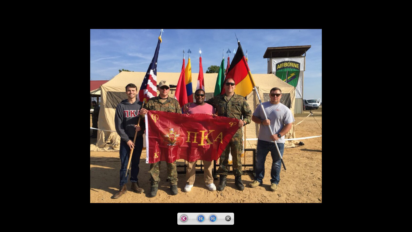 Five Mu Eta Chapter Members With Flags Photograph
