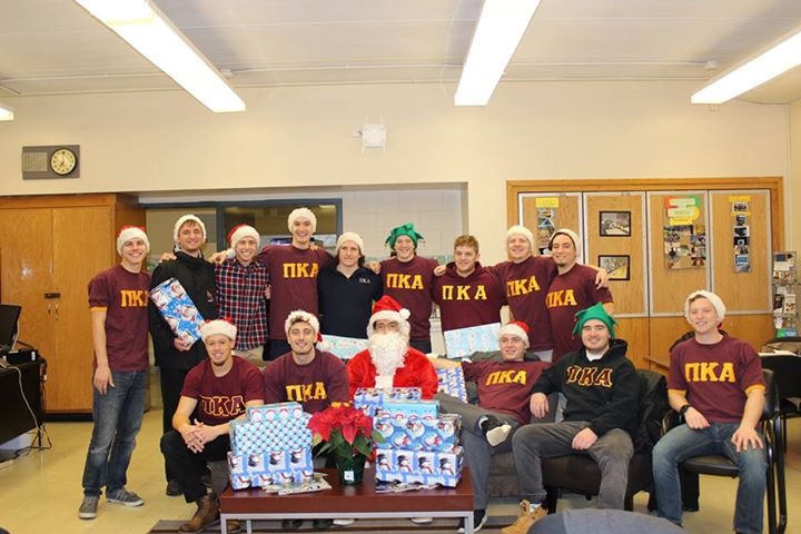 Gamma Tau Chapter Members Host A Christmas Event with Santa Photograph